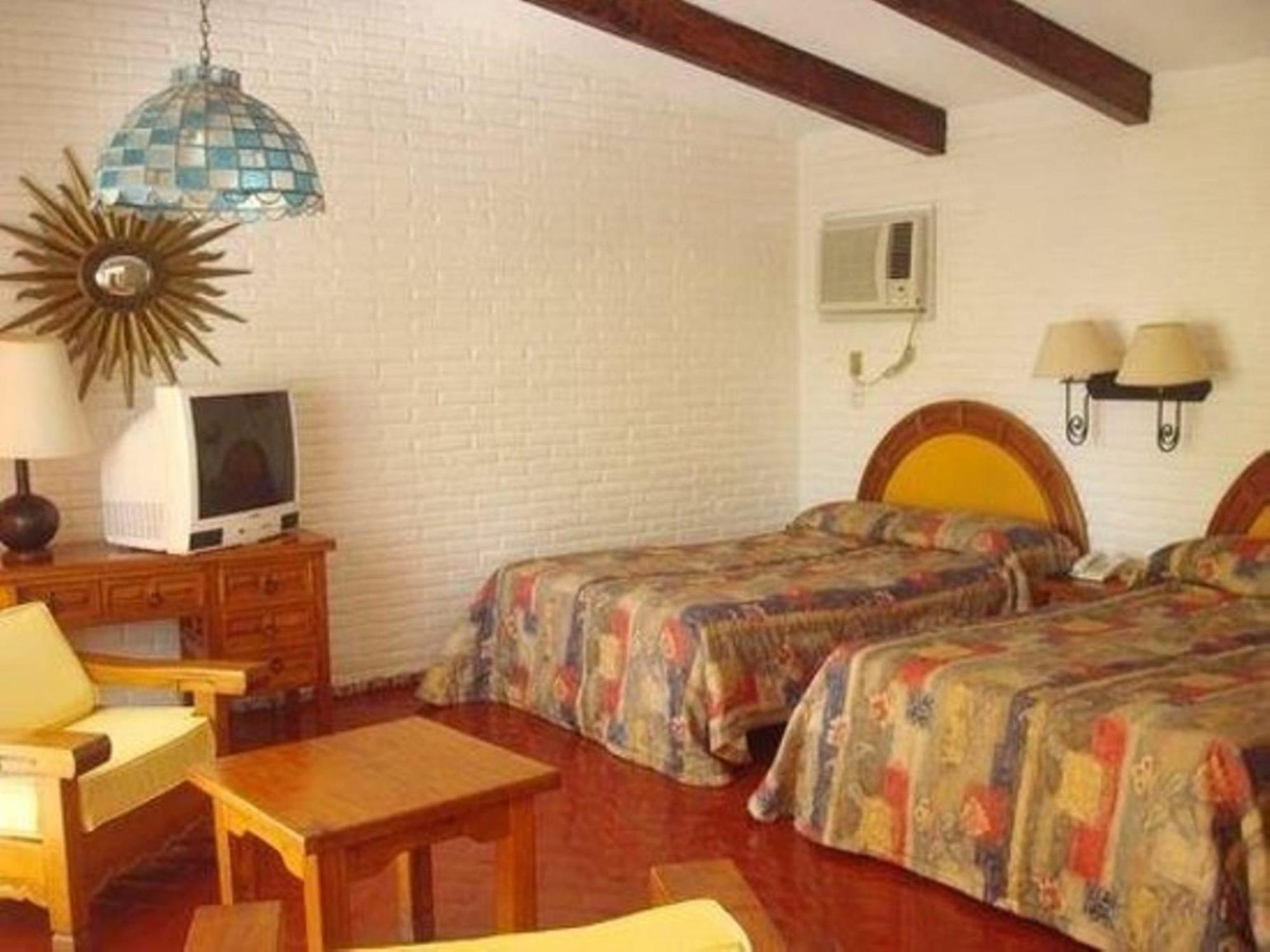 Real Bananas All Inclusive Acapulco Zimmer foto